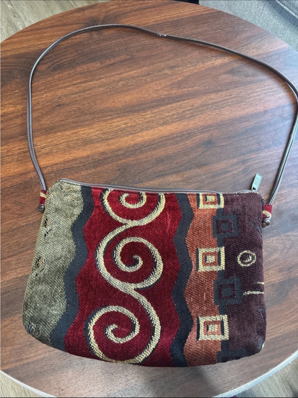 Pinky Red and Brown Woven Crossbody Bag with Swirl Motif